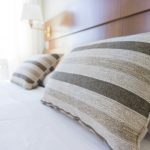 Hotel Search Australia - gray and black throw pillow on bed