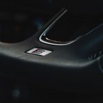 Steering Wheel Australia - black honda steering wheel in close up photography