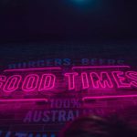 No Smoking Sign Australia - selective focus photography of pink good times neon light signage