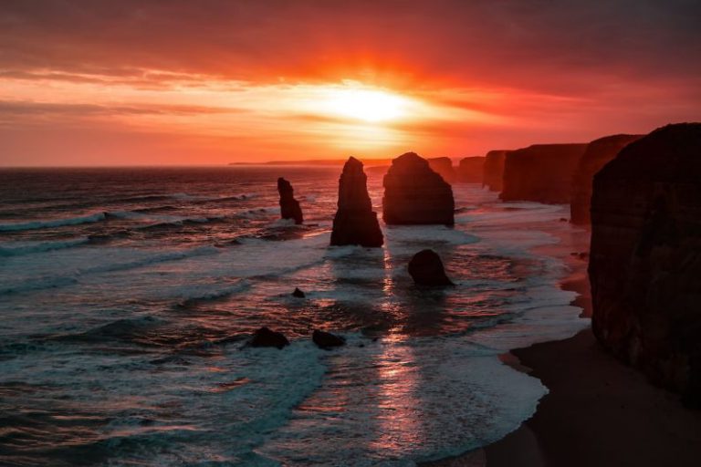 Outback Sunset Australia - silhouette of stone on seashore during golden hour