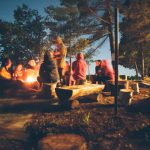 Camping Tent Australia - group of people near bonfire near trees during nighttime
