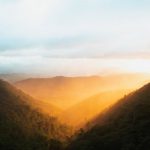 Retreat Nature Australia - green mountains under white sky during daytime