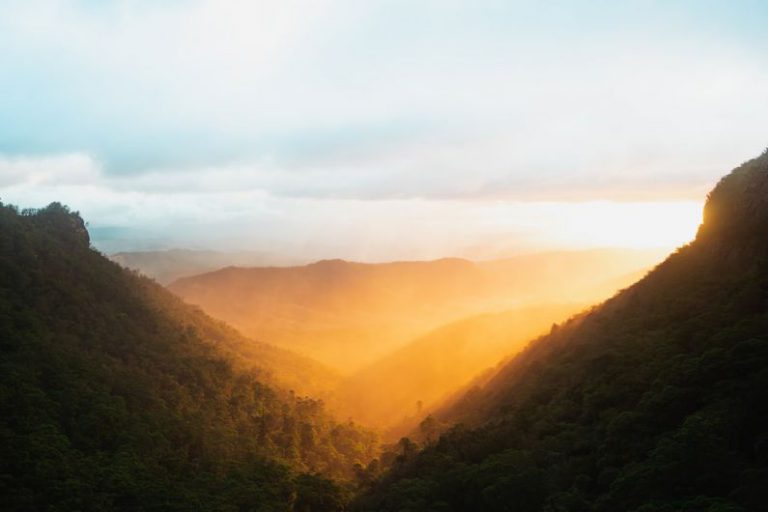 Retreat Nature Australia - green mountains under white sky during daytime