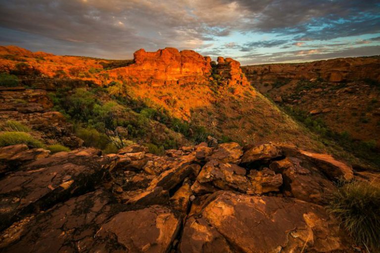 Historic Castle Australia - aerial view of rock cliffs under cloudy sky