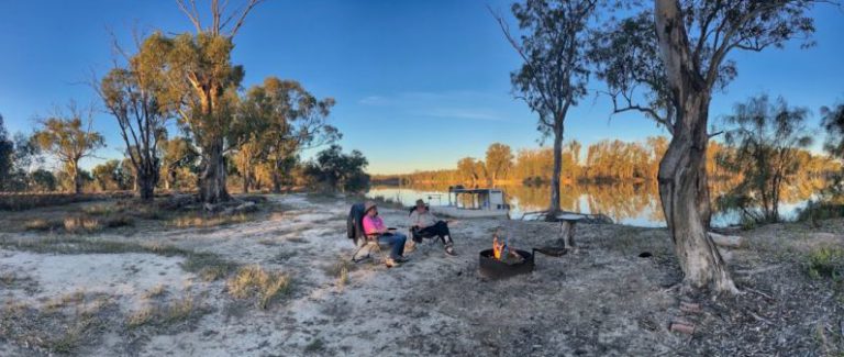 Murray River Australia - people sitting on ground near trees during daytime