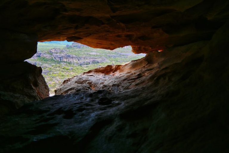Grampians Park Australia - a cave with a view of a valley below