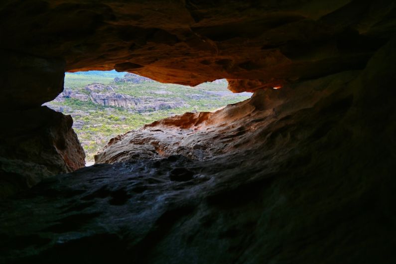 Grampians Park Australia - a cave with a view of a valley below