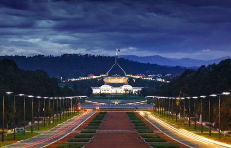 Canberra - brown concrete pathway during night
